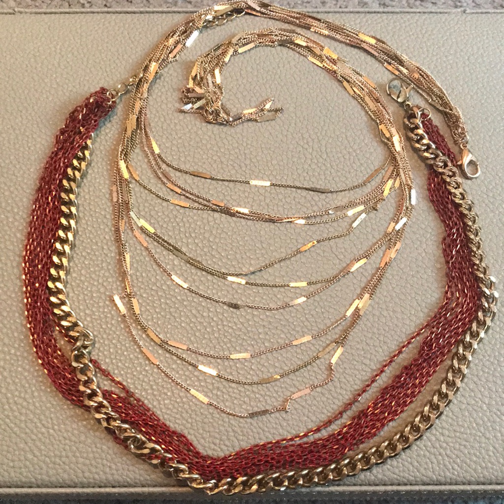Two Multi-Strand Necklaces 12$